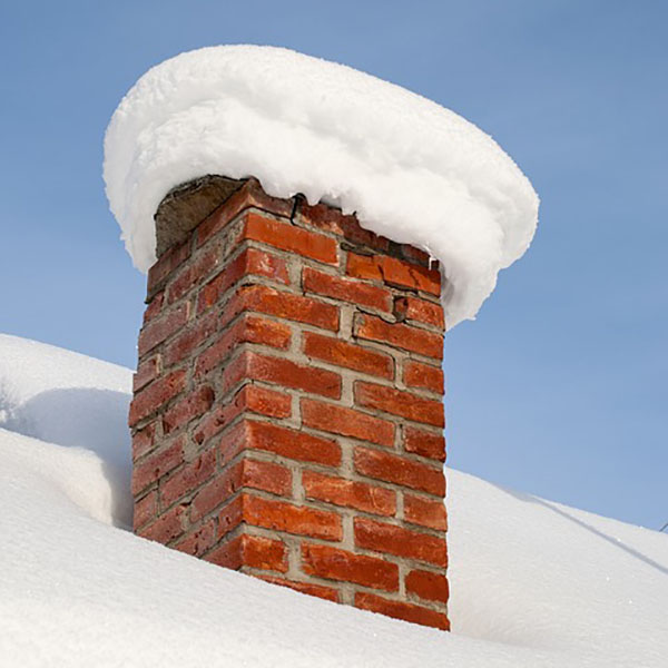 snowy chimney damage